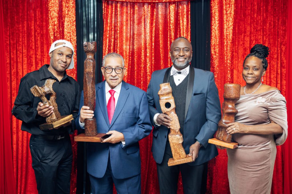 2025 Legacy Award Winners - Andrew Jacobi, Frank Dunn, Dr. George Williams and Grace Roy. Sculptor Billy Edmonds created the stunning awards.