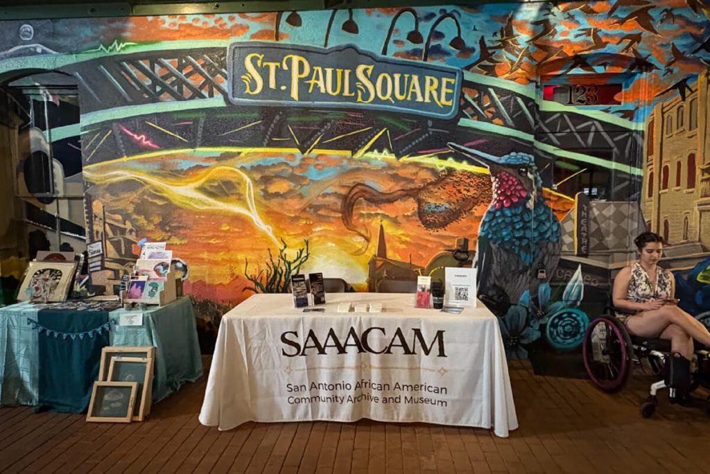 SAAACAM at a community event in St. Paul Square.